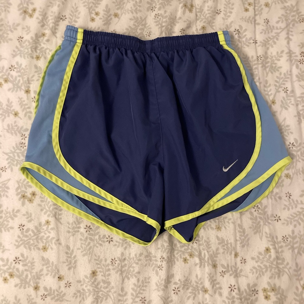 Blue and yellow Nike shorts